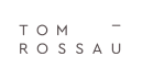 Tom Rossau logo w Dagma Concept